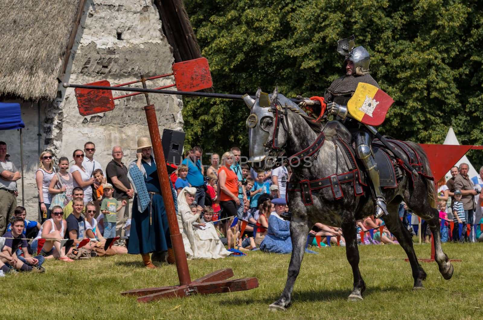 CHORZOW,POLAND, JUNE 9: Medieval knight on horseback showing the by Attila