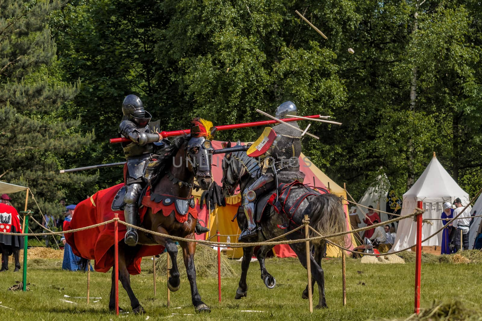 CHORZOW,POLAND, JUNE 9: Medieval knights jousting during a IV Convention of Christian Knighthood on June 9, 2013, in Chorzow