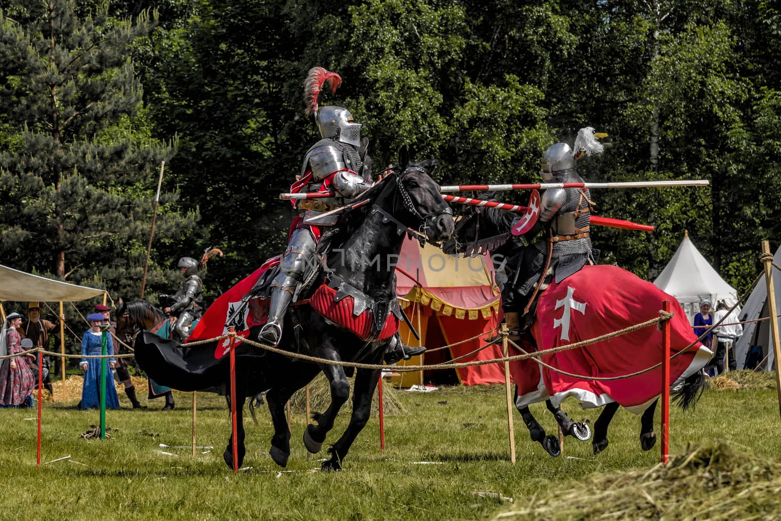 CHORZOW,POLAND, JUNE 9: Medieval knights jousting during a IV Convention of Christian Knighthood on June 9, 2013, in Chorzow