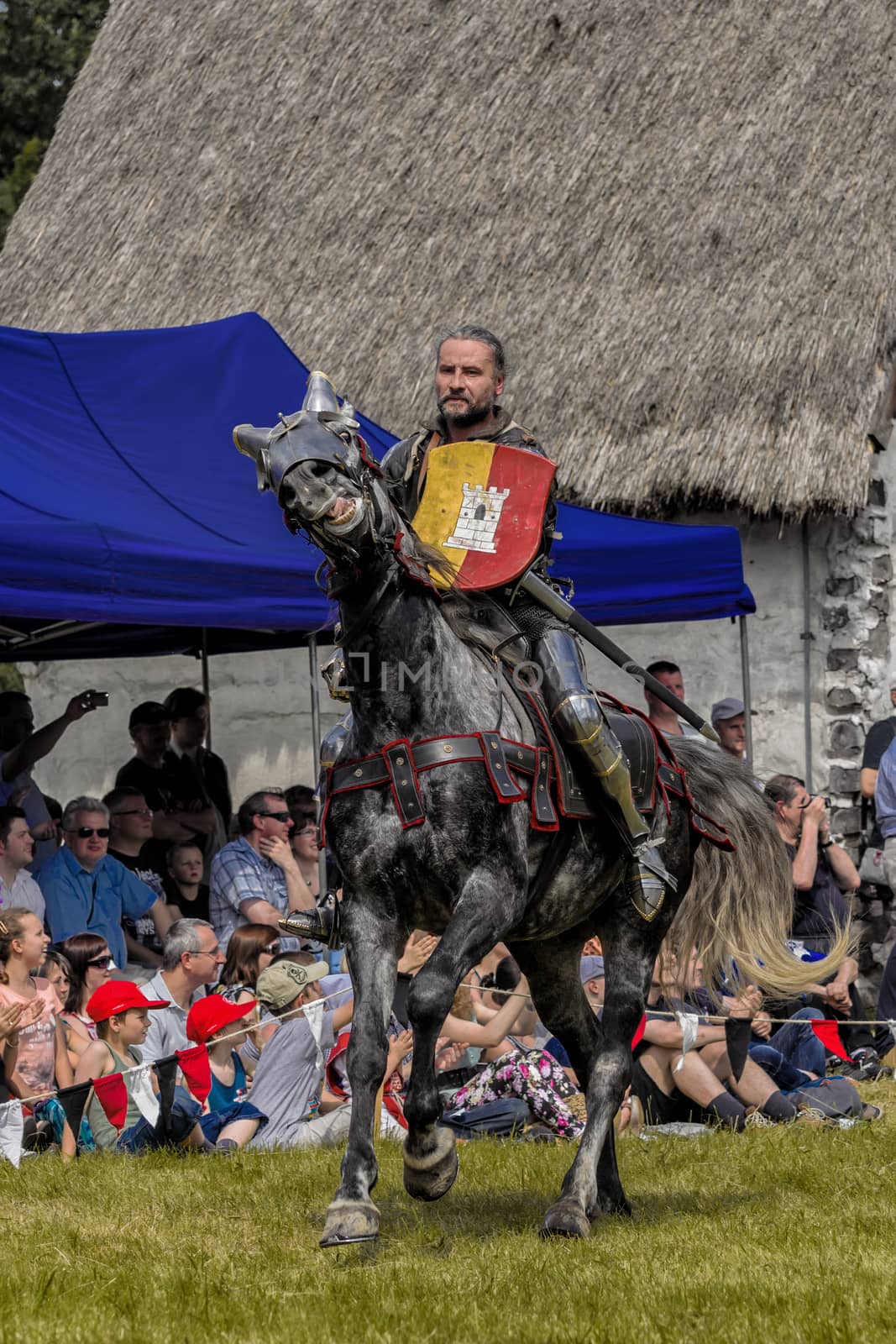 CHORZOW,POLAND, JUNE 9: Medieval knight on horseback during a IV Convention of Christian Knighthood on June 9, 2013, in Chorzow