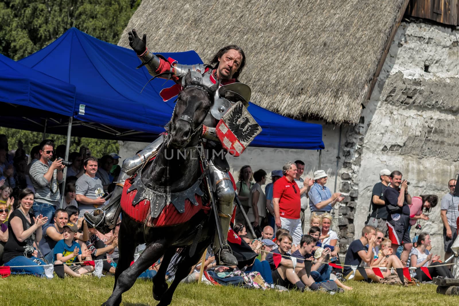 CHORZOW,POLAND, JUNE 9: Medieval knight on horseback during a IV Convention of Christian Knighthood on June 9, 2013, in Chorzow