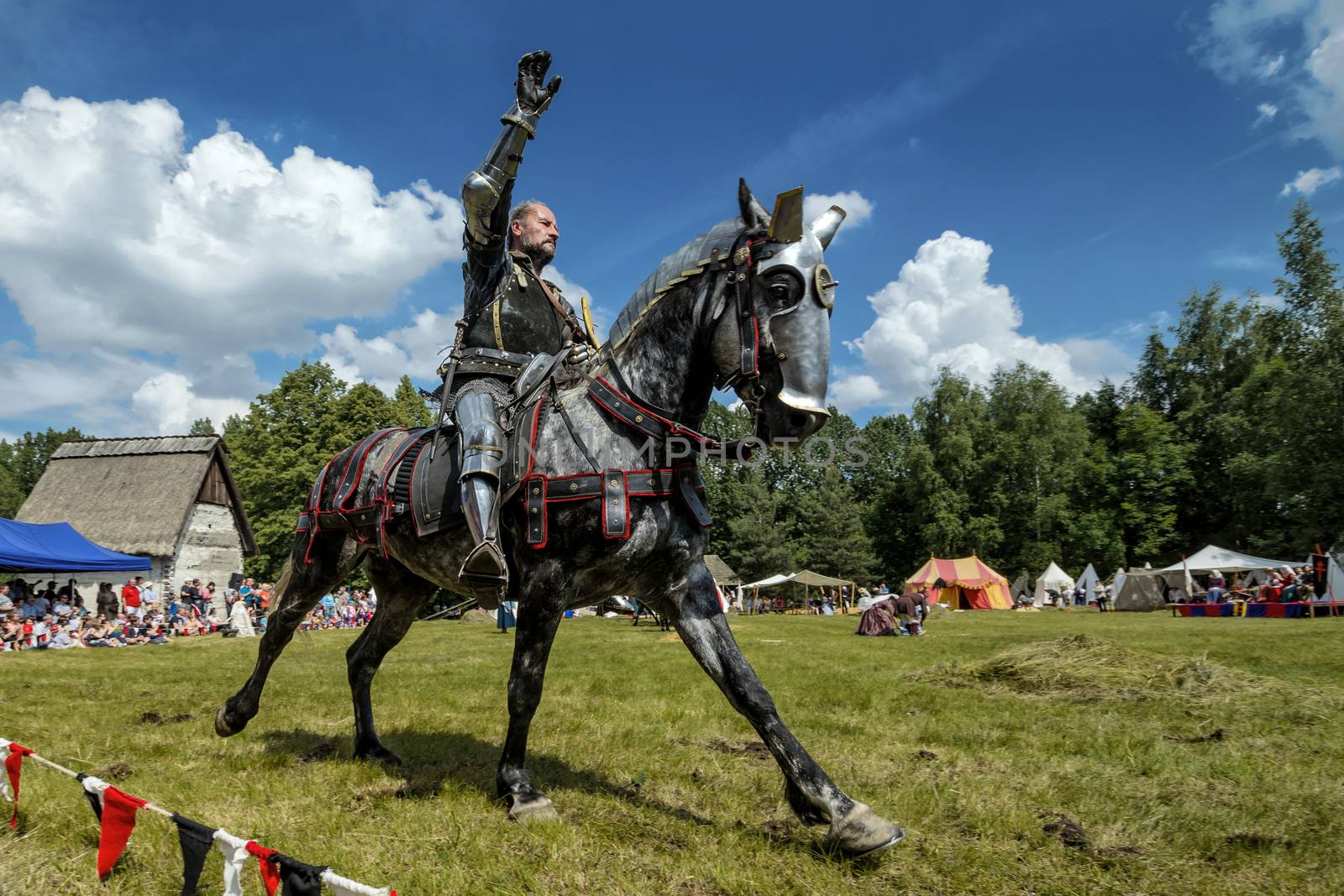 CHORZOW,POLAND, JUNE 9: Medieval knight on horseback during a IV by Attila