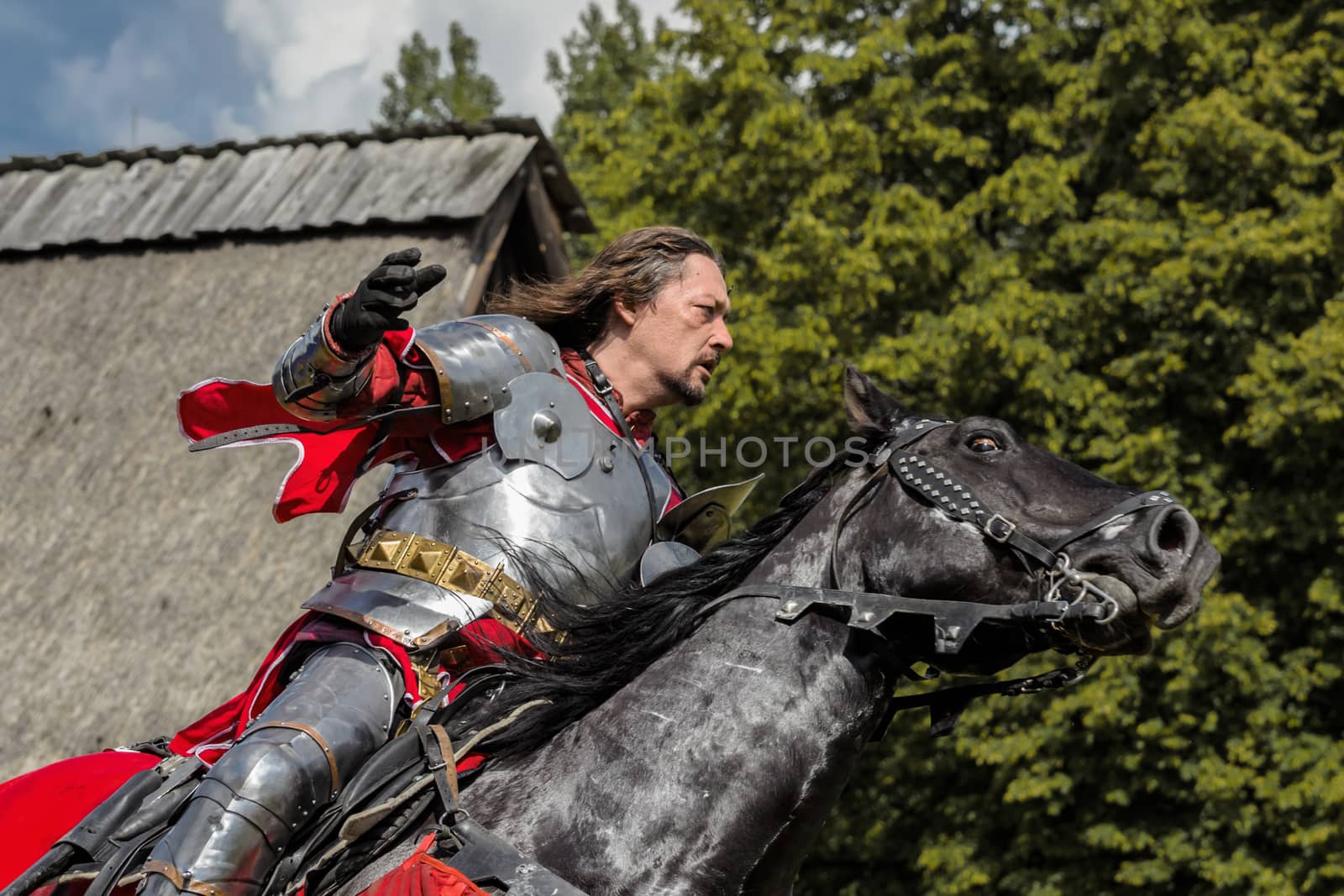 CHORZOW,POLAND, JUNE 9: Medieval knight on horseback during a IV Convention of Christian Knighthood on June 9, 2013, in Chorzow