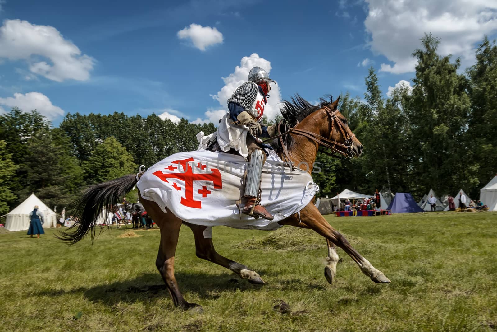 CHORZOW,POLAND, JUNE 9: Medieval knight on horseback during a IV Convention of Christian Knighthood on June 9, 2013, in Chorzow