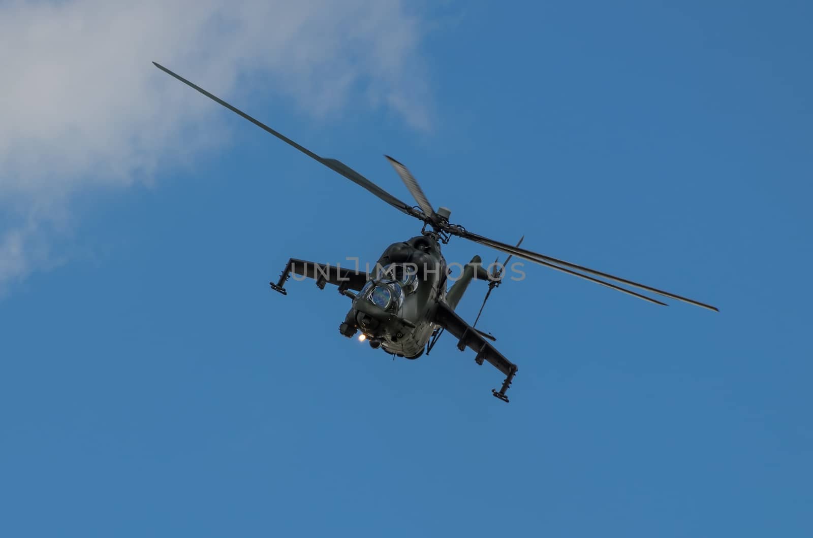 RADOM, POLAND - AUGUST 25: MI-24 Hind display during Air Show 2013 event on August 25, 2013 in Radom, Poland