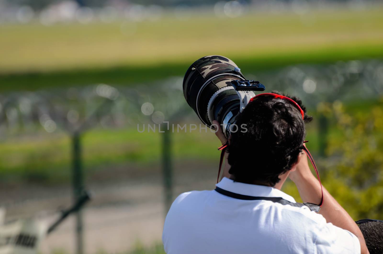 Aircraft spotter with camera by Attila