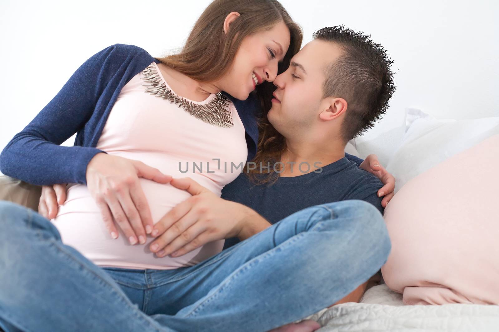 pregnant couple with heart shape by DNFStyle