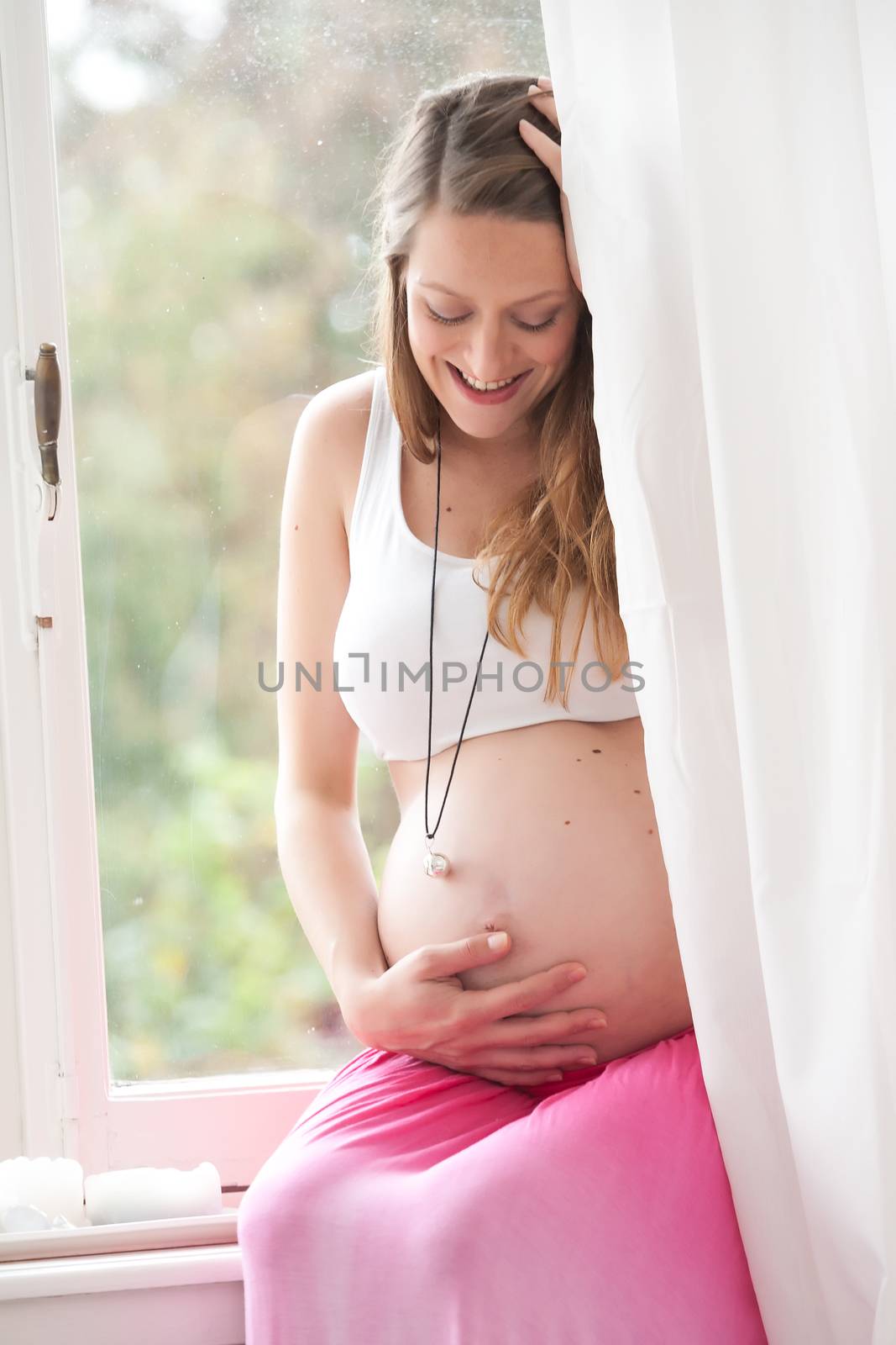 Pregnant woman in her window by DNFStyle