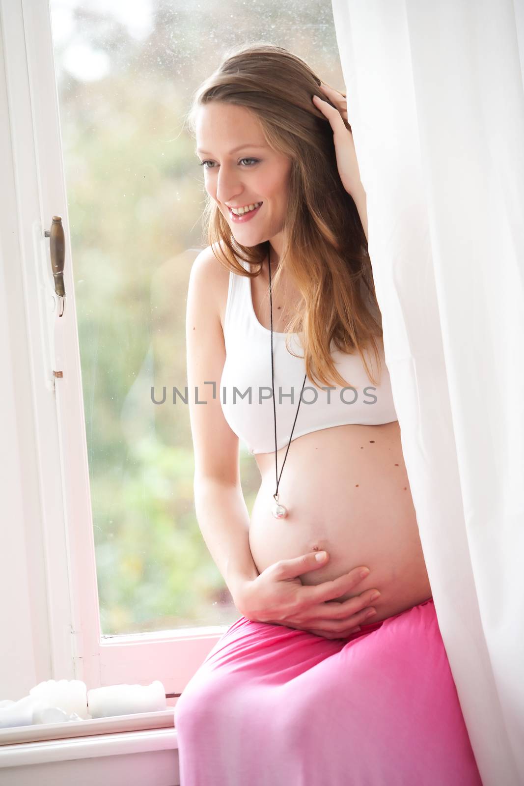 Young pregnant woman by DNFStyle