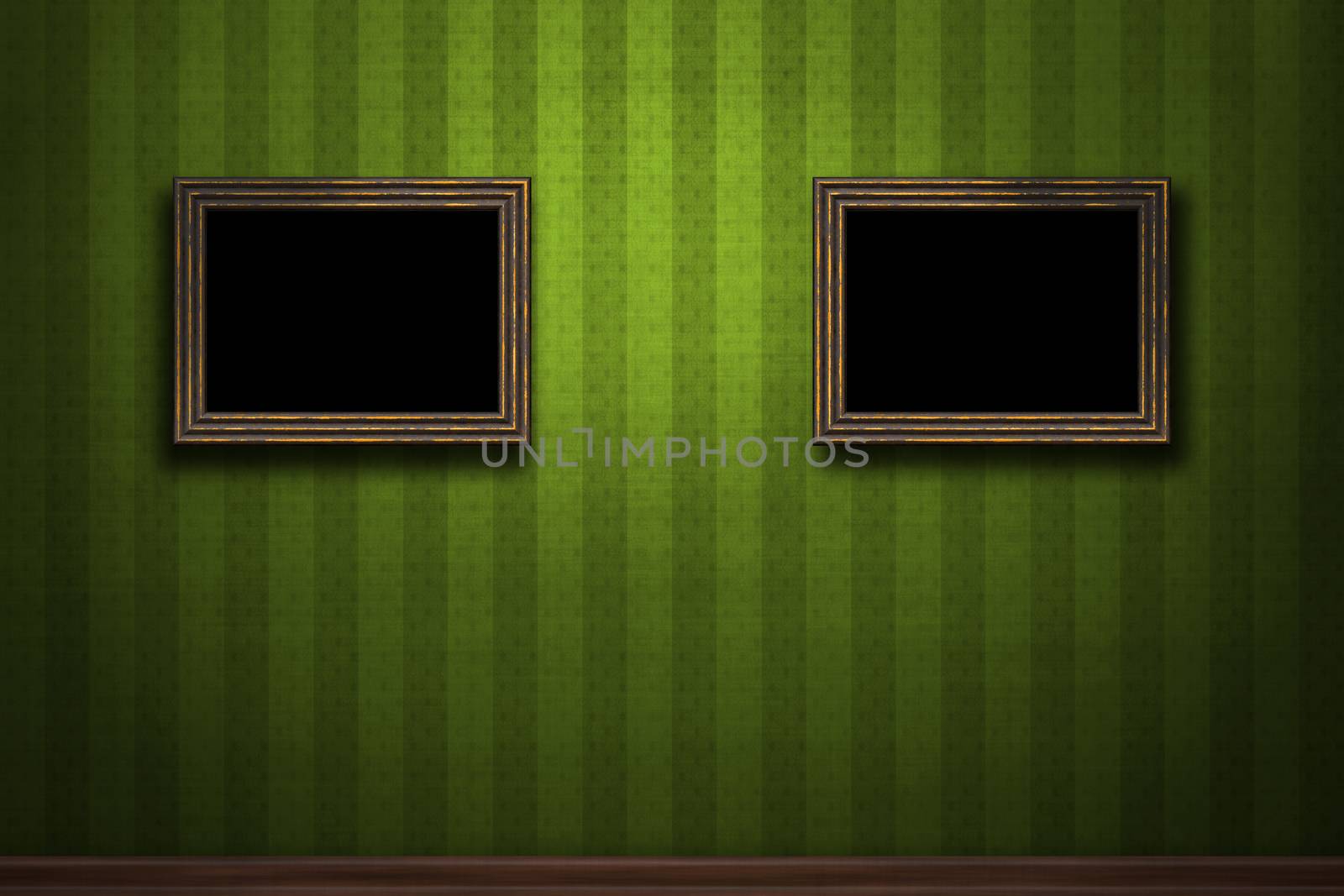 Old wooden frames on greenretro grunge wall