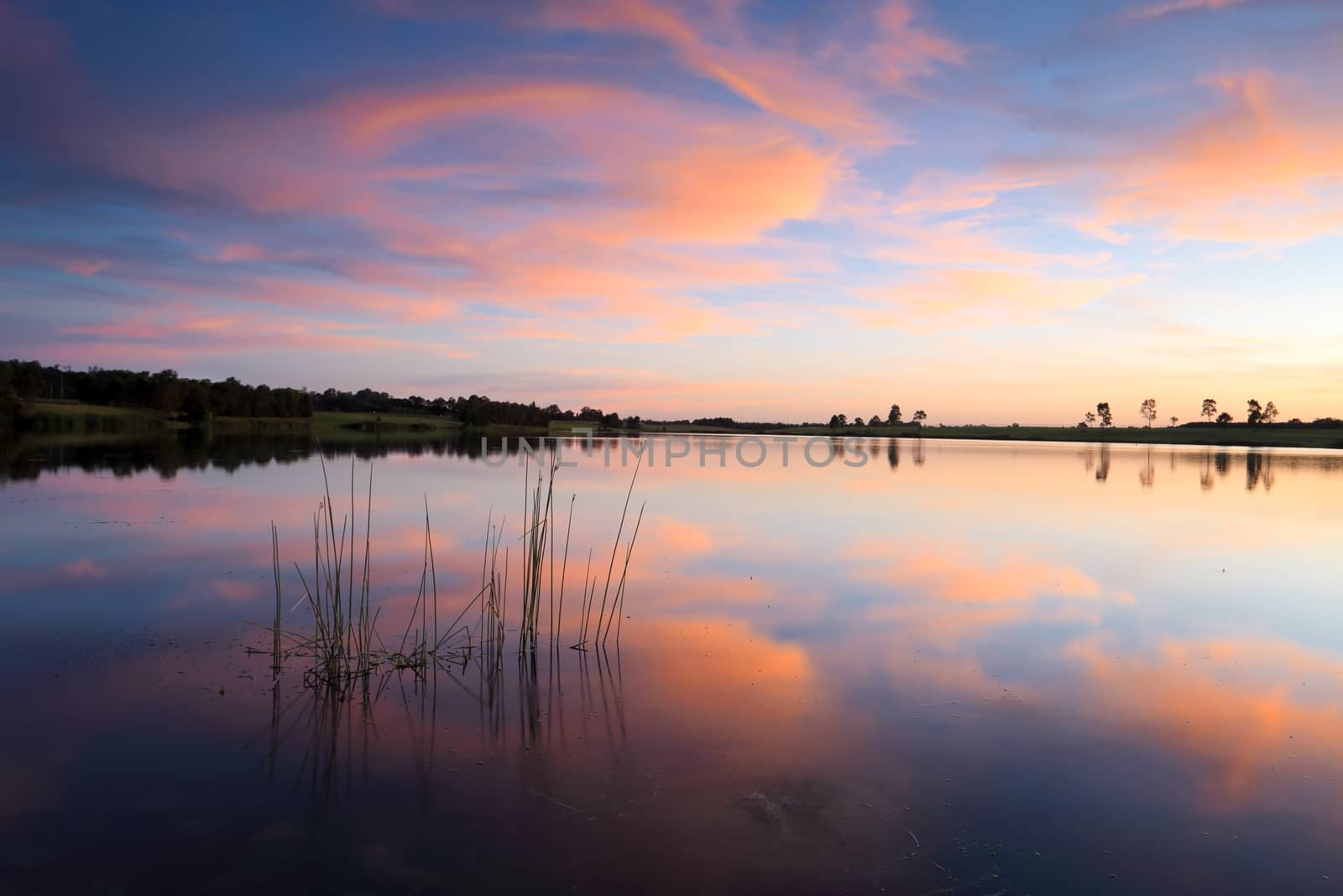 Sensational sunset over Duralia Lake, Penrith Lakes, Australia
