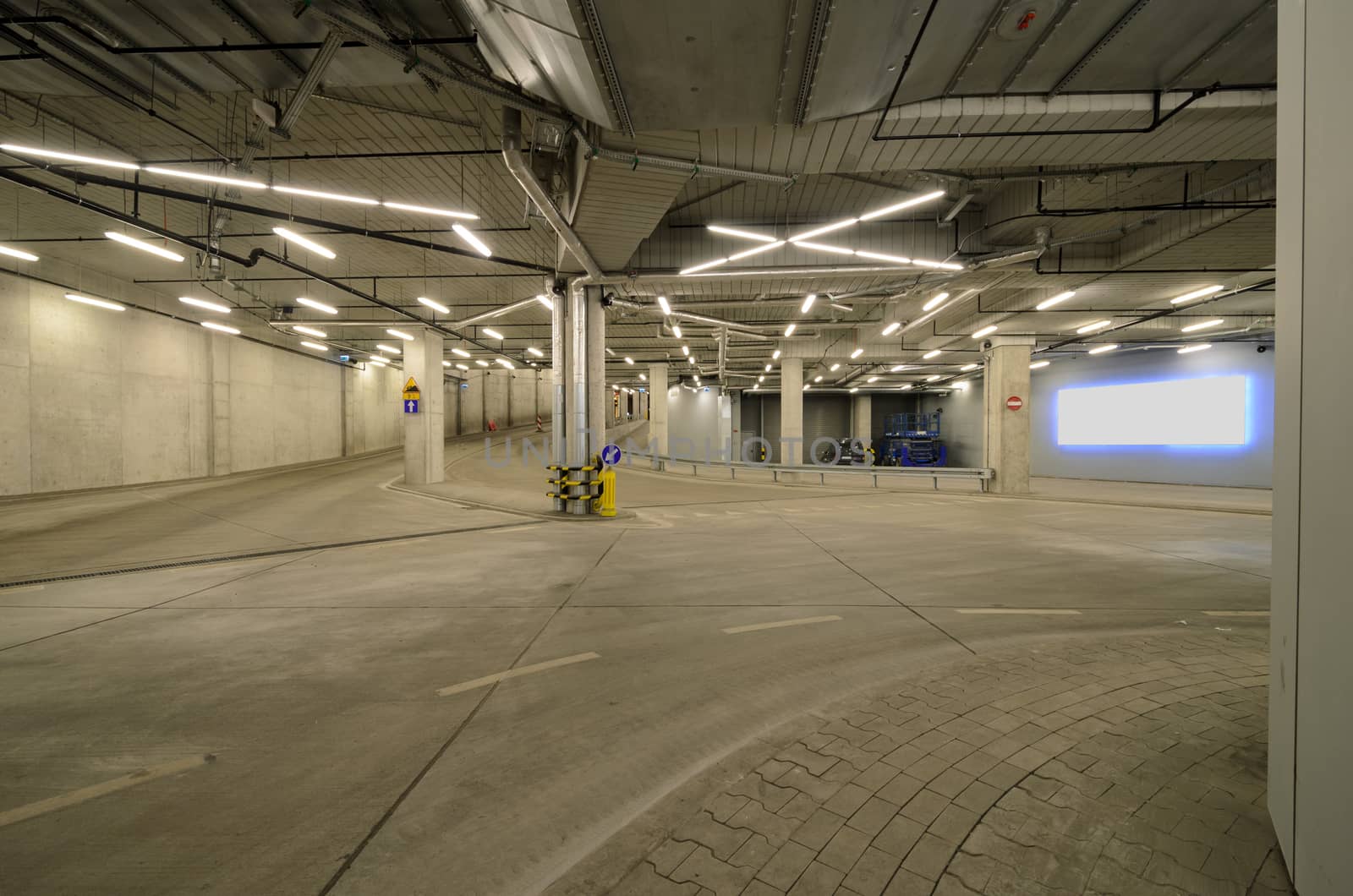 Interior of an urban tunnel without traffic with blank billboard by Attila