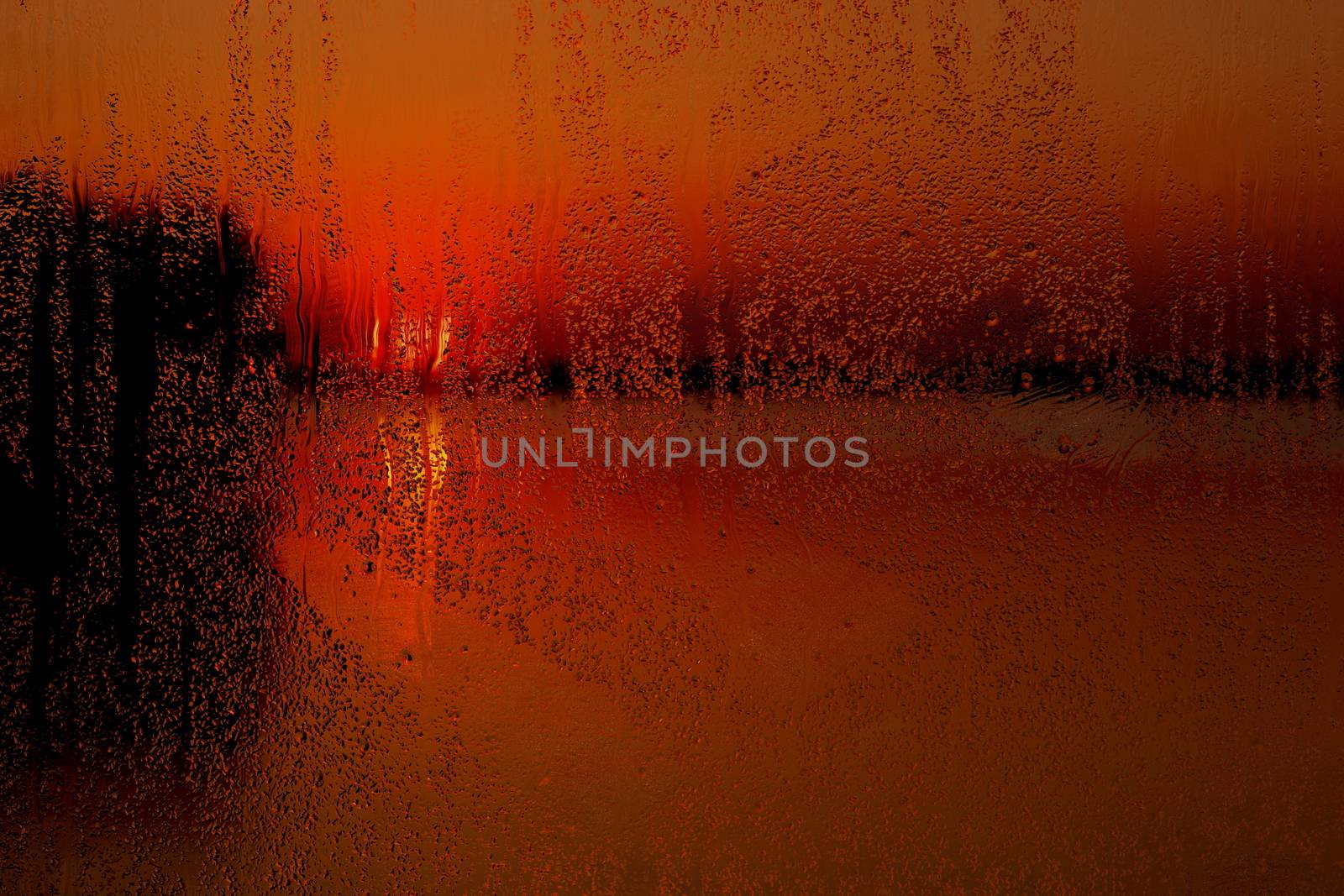 Rainy window at sunset by Attila