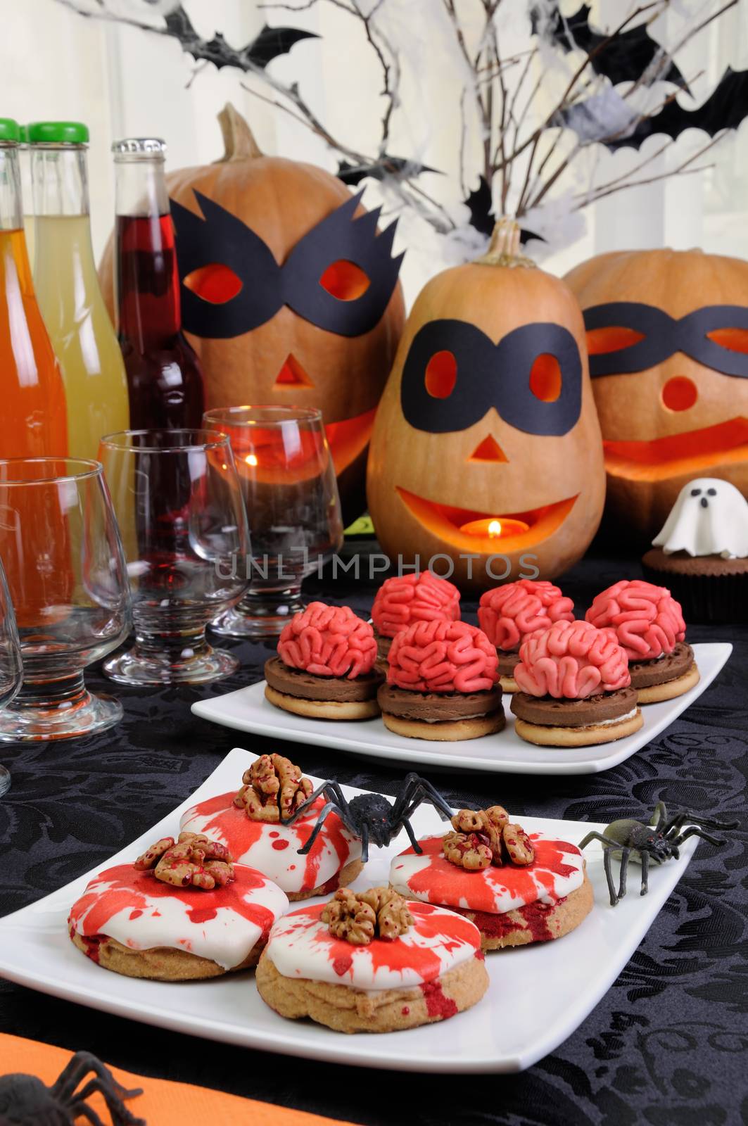 Table served with a variety of sweets and drinks on Halloween