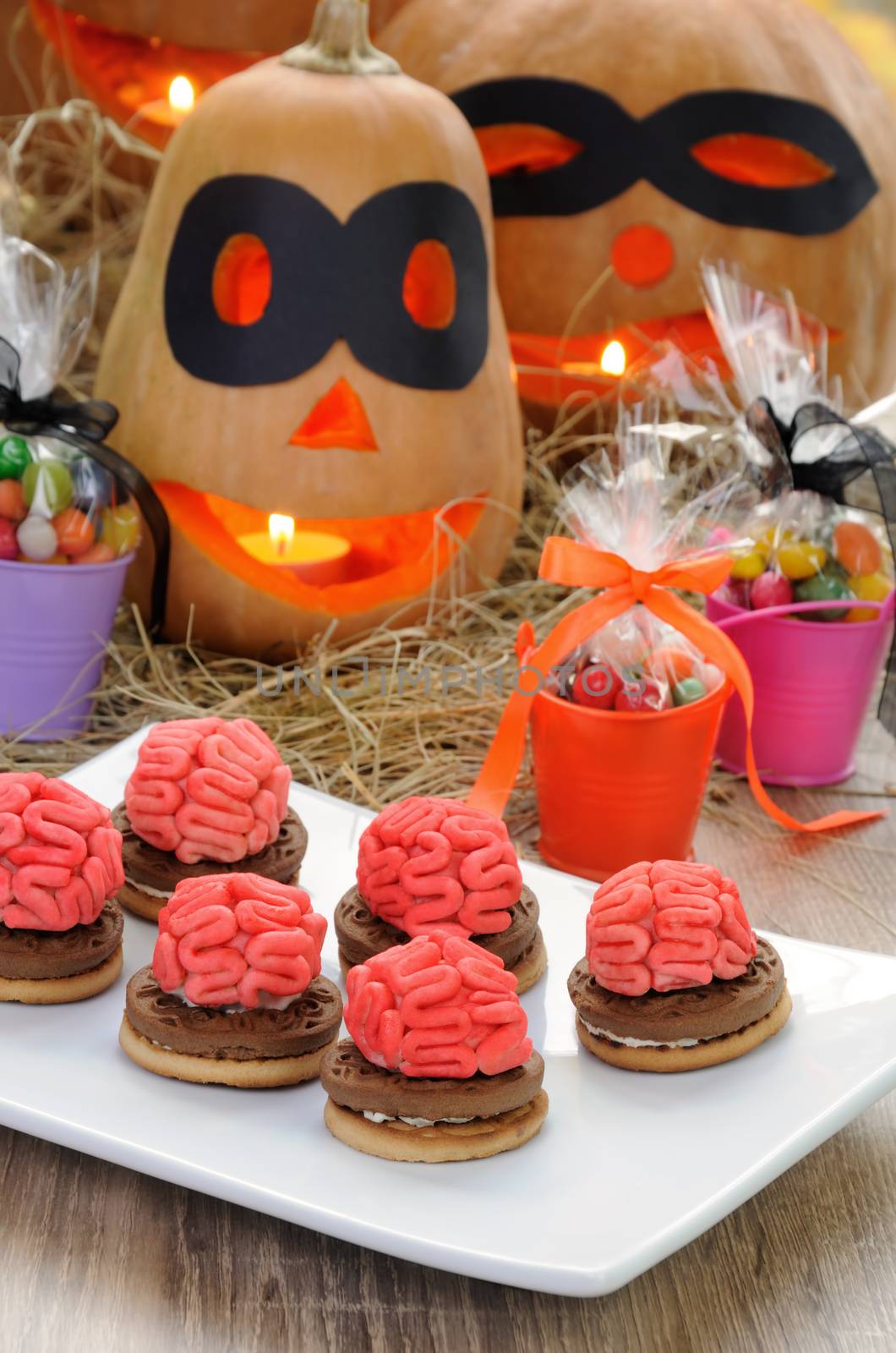 Cookies with the brains of marzipan on a table in Halloween