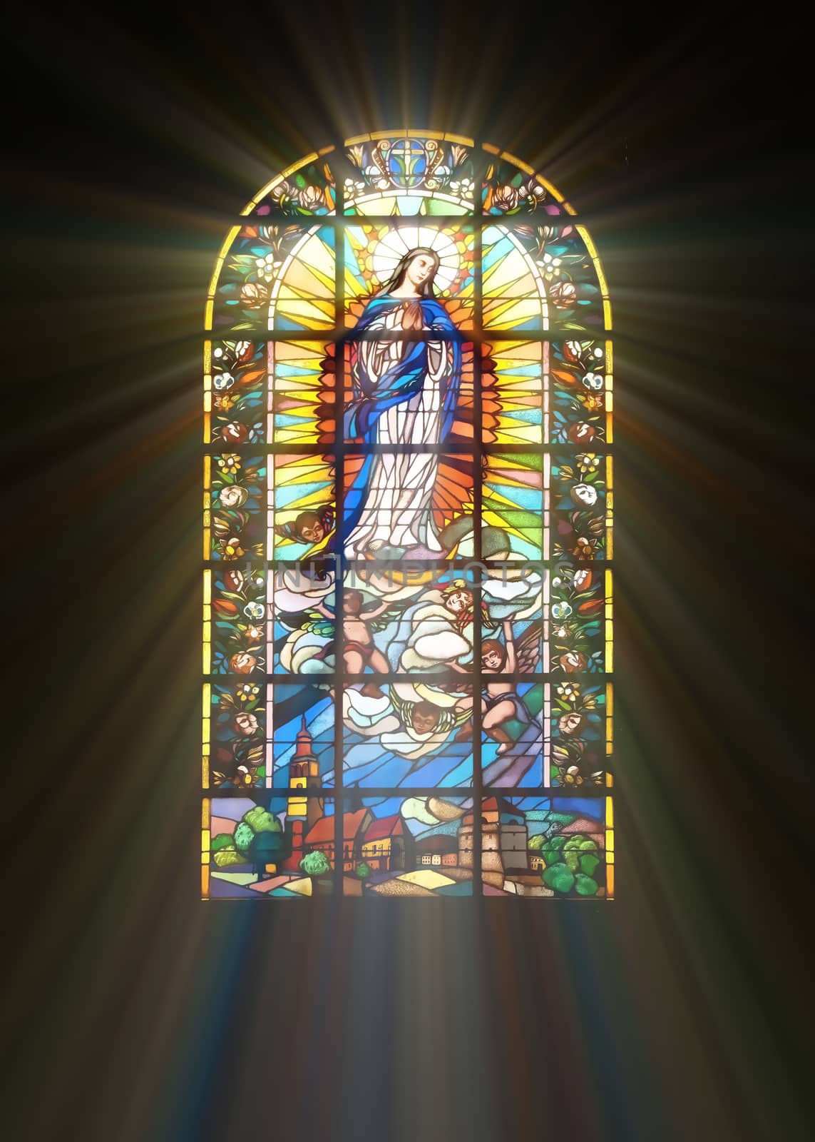 Biblical stained glass with rays of light shining through