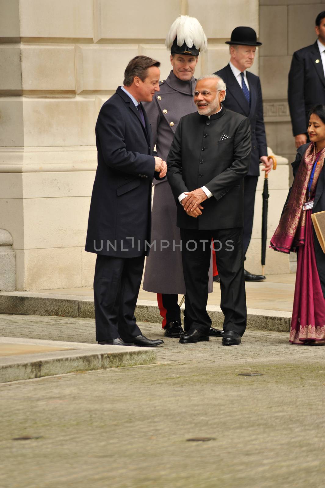 UK, London: Indian Prime Minister Narendra Modi laughs with British Prime Minister David Cameron on Whitehall shortly after his arrival in London on November 12, 2015. Modi's three-day visit marks the first by an Indian Prime Minister in more than a decade.