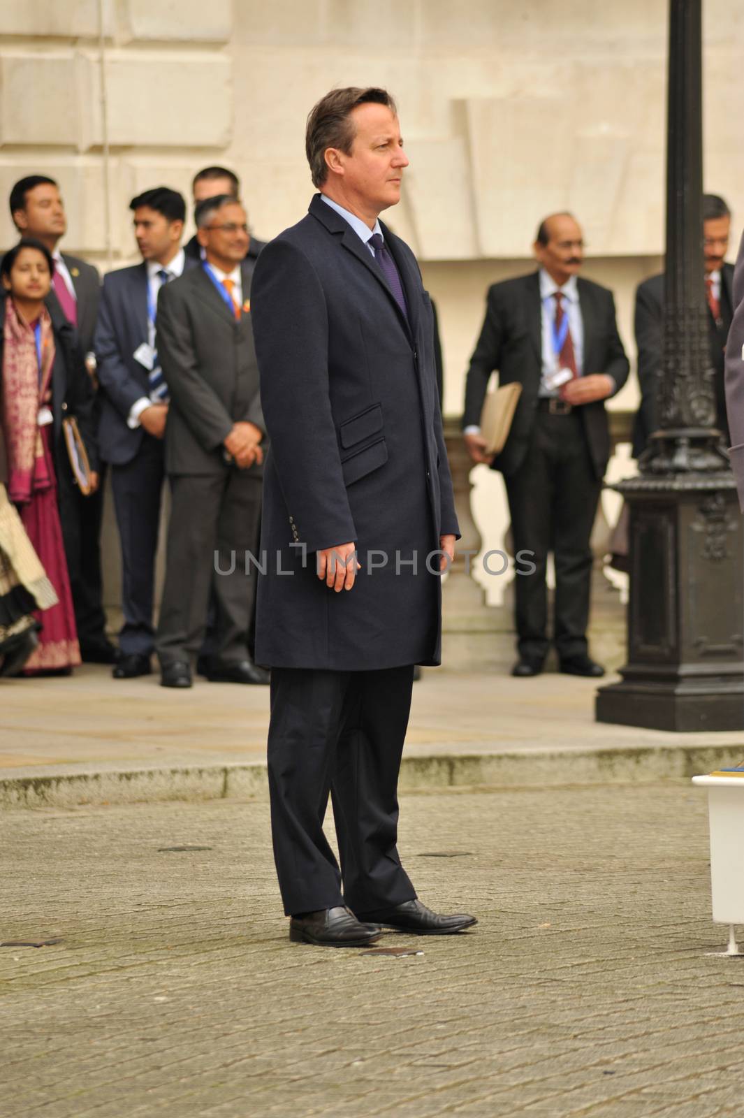 UK, London: British Prime Minister David Cameron looks on during an honor guard procession on Whitehall for Indian Prime Minister Narendra Modi's arrival in London on November 12, 2015. Modi's three-day visit marks the first by an Indian Prime Minister in more than a decade.