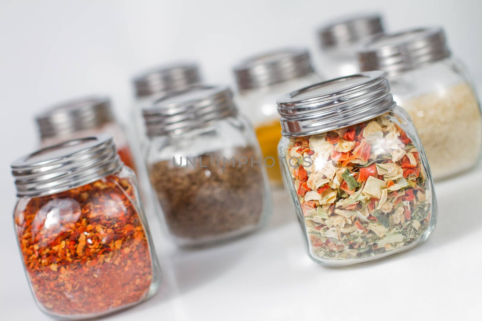 Various Indian spices in glass jars