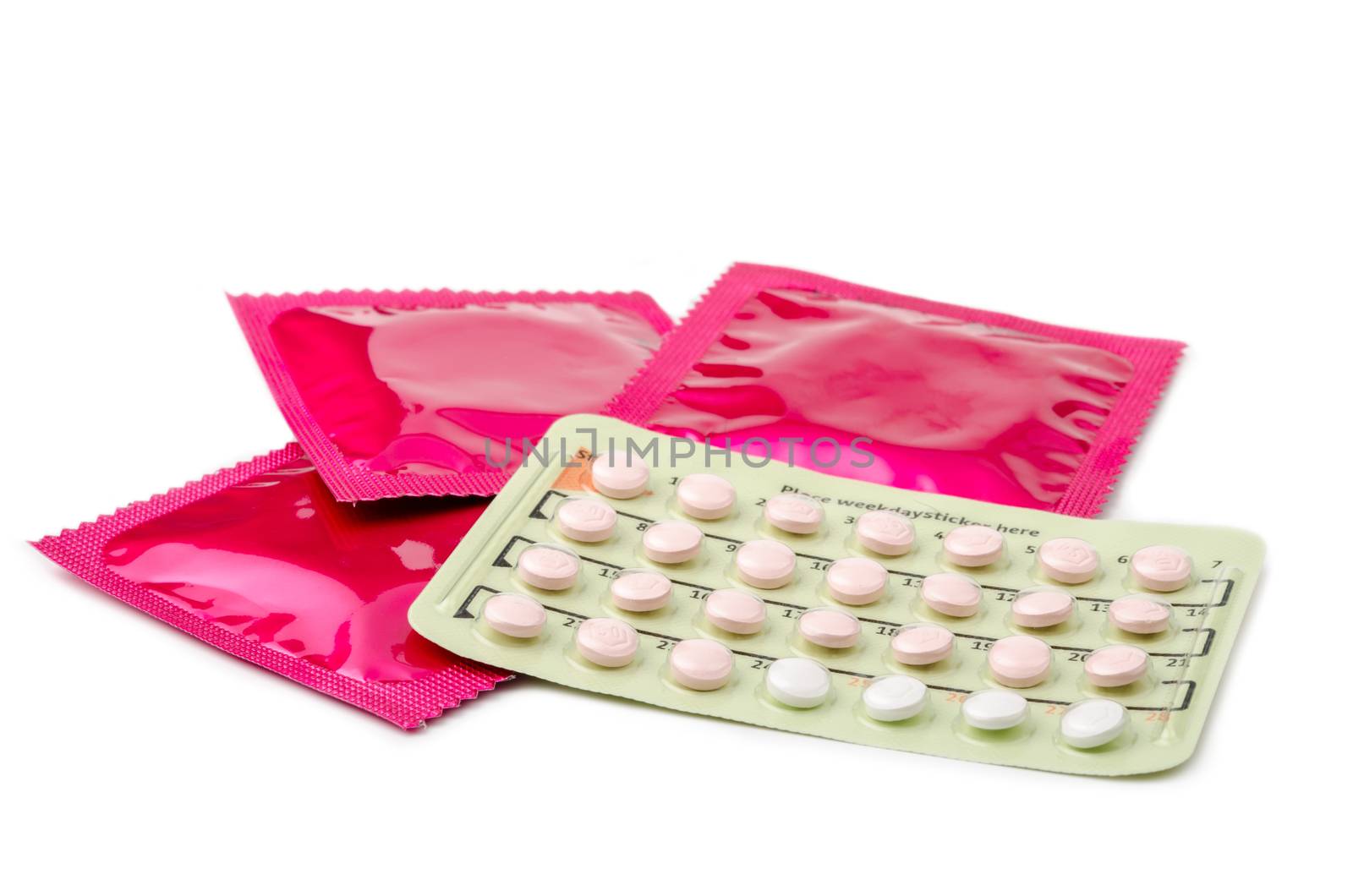 Contraceptive Pill and condoms. by Gamjai