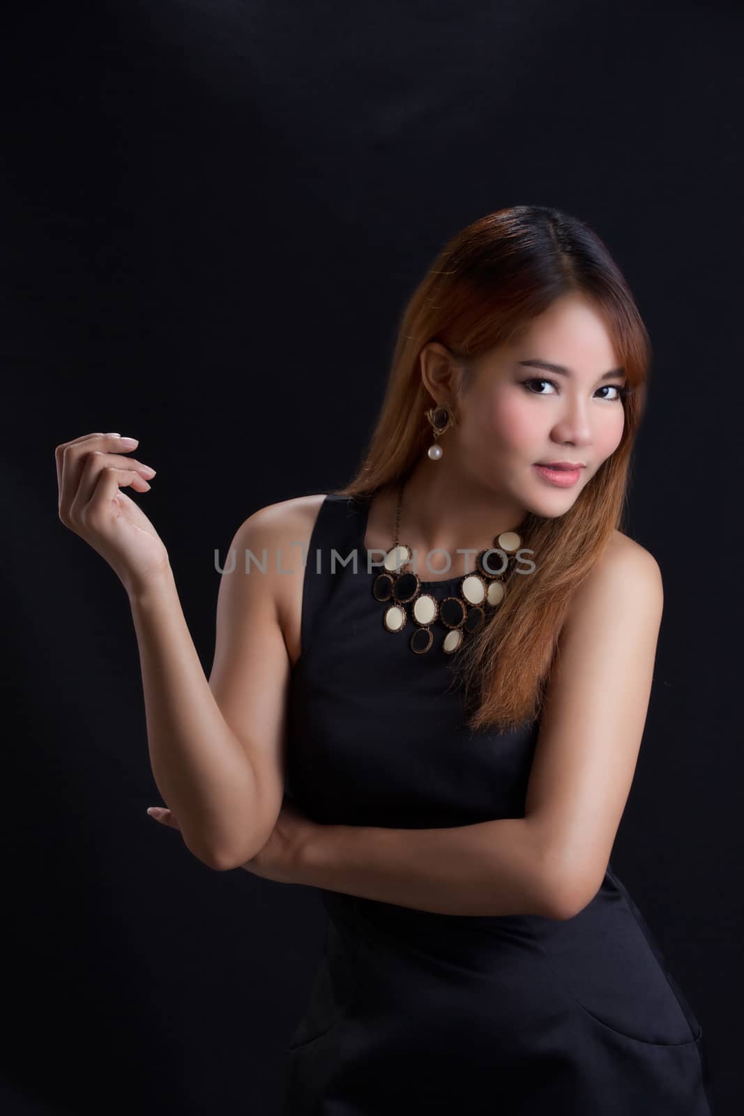 Portrait of young Asian girl - black dress