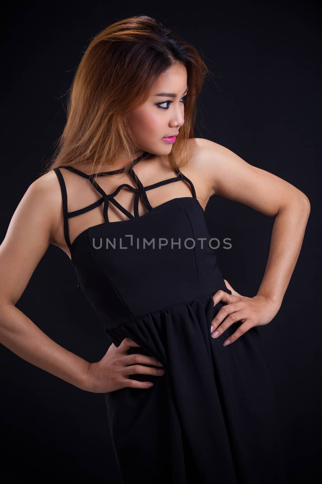 Portrait of young Asian girl - sexy, pretty dress