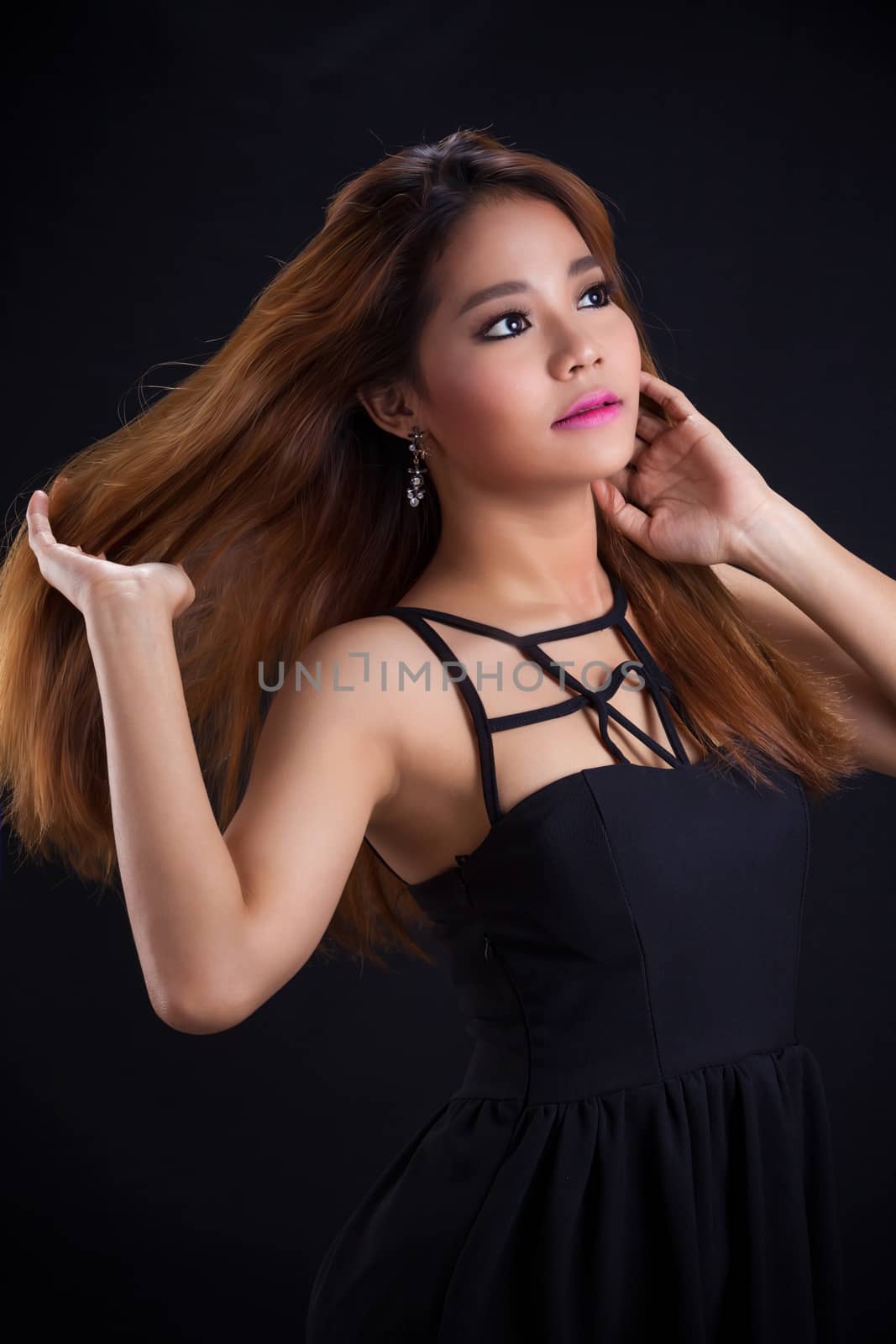 Portrait of young Asian girl - sexy, pretty dress