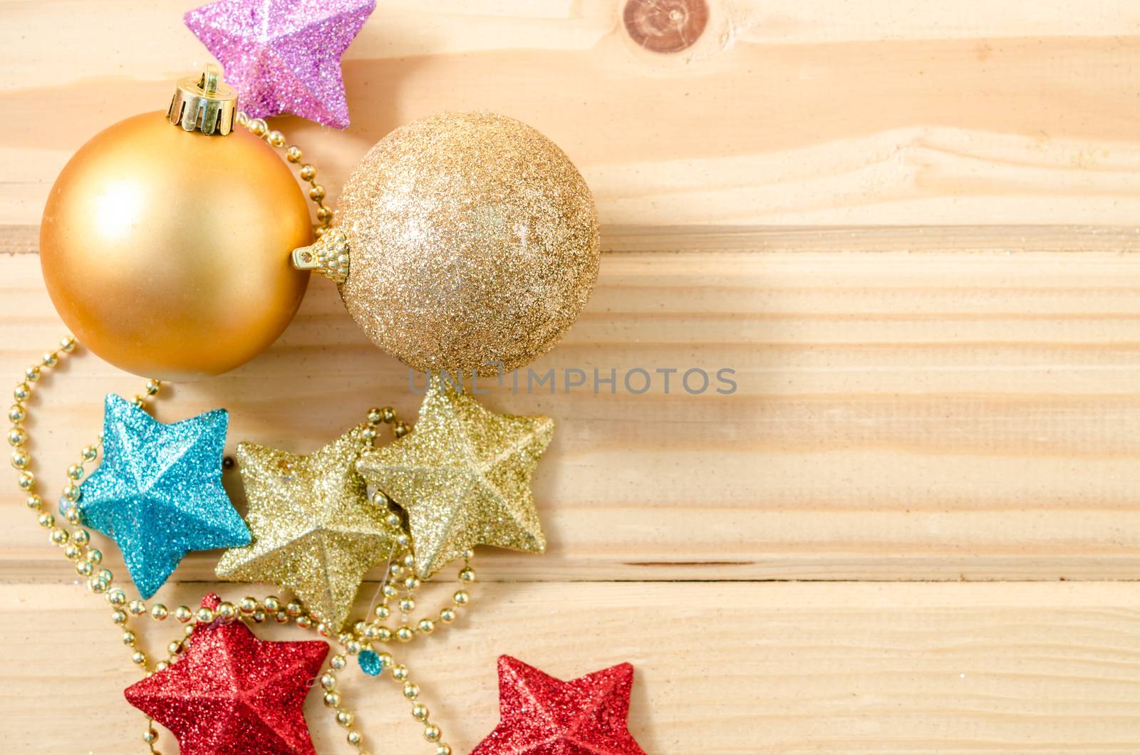 Christmas decorations on wooden background.