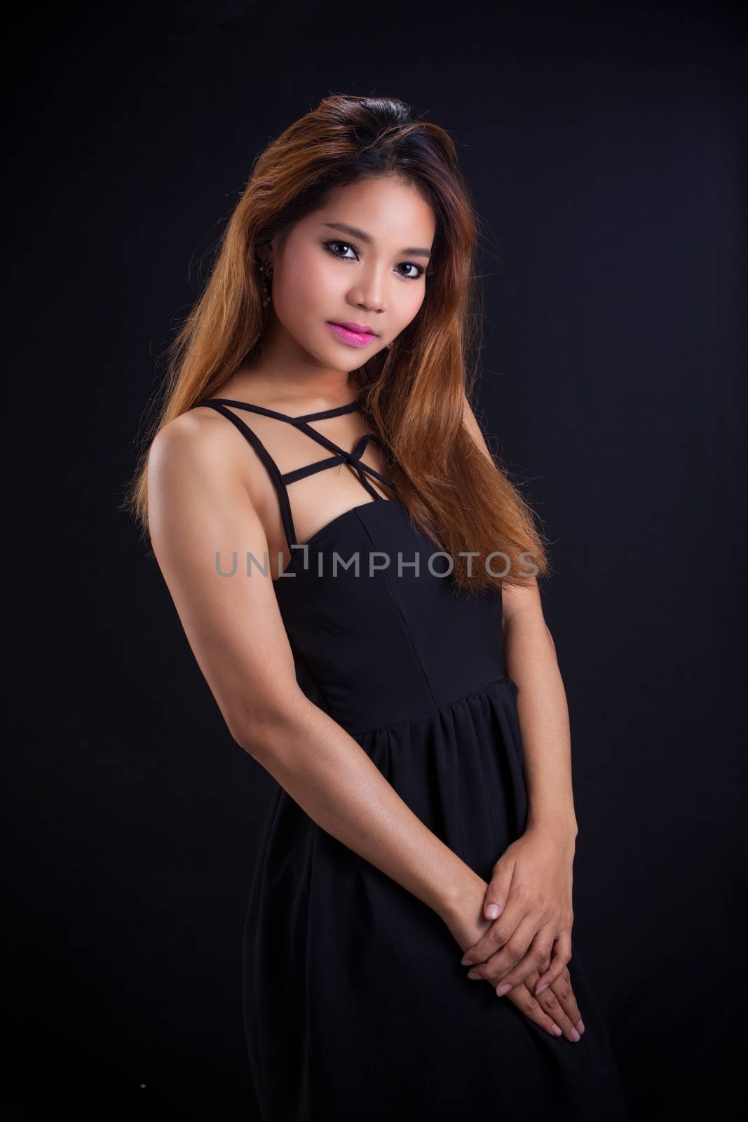 Portrait of young Asian girl - sexy, pretty dress