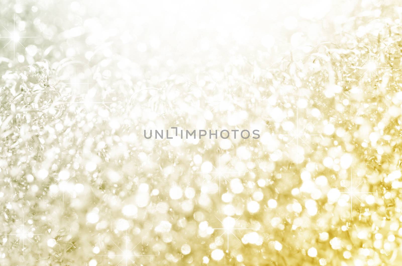Lights on gold with star bokeh. by Gamjai