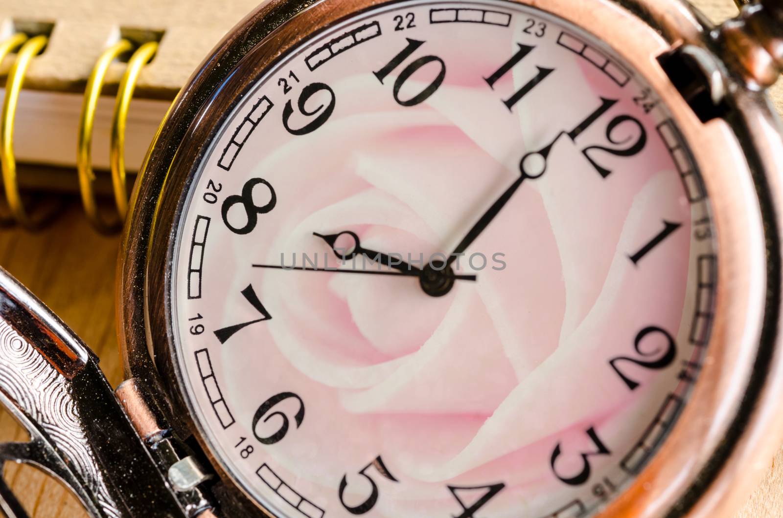 Composite of pink Roses and Clock. Love concept.