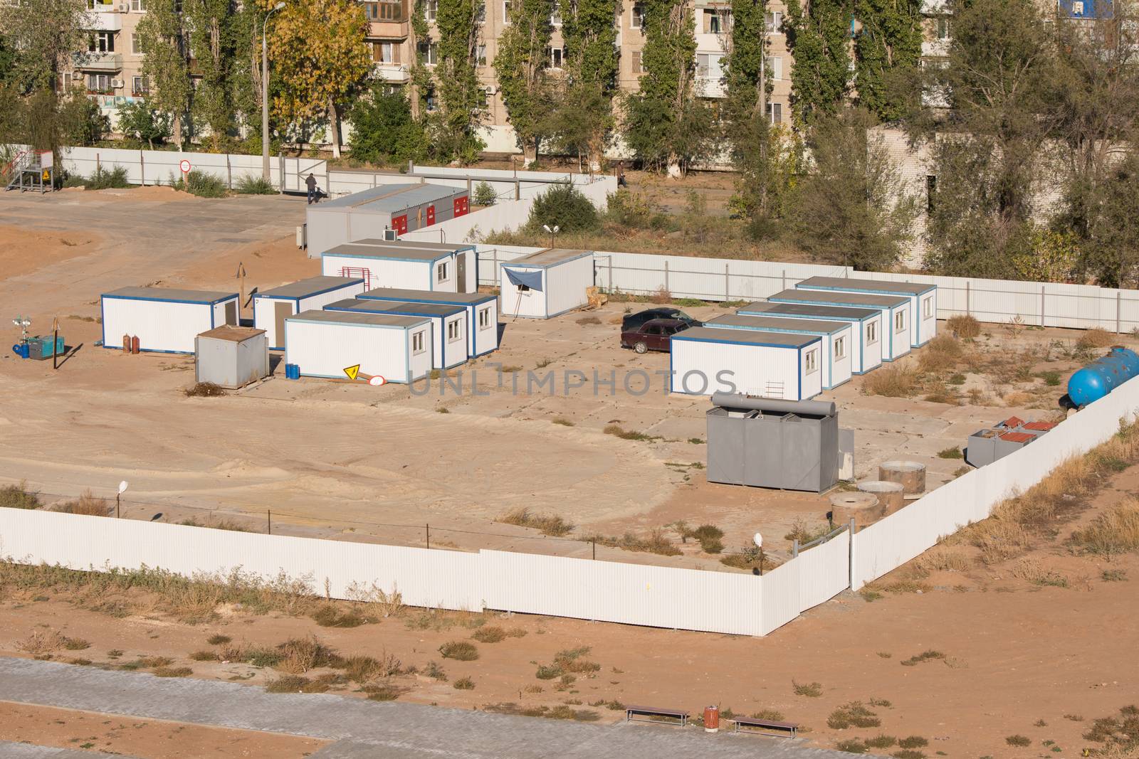 Volgograd, Russia - October 13, 2015: Aerial view of the fenced area on which the construction of a new multi-storey residential house