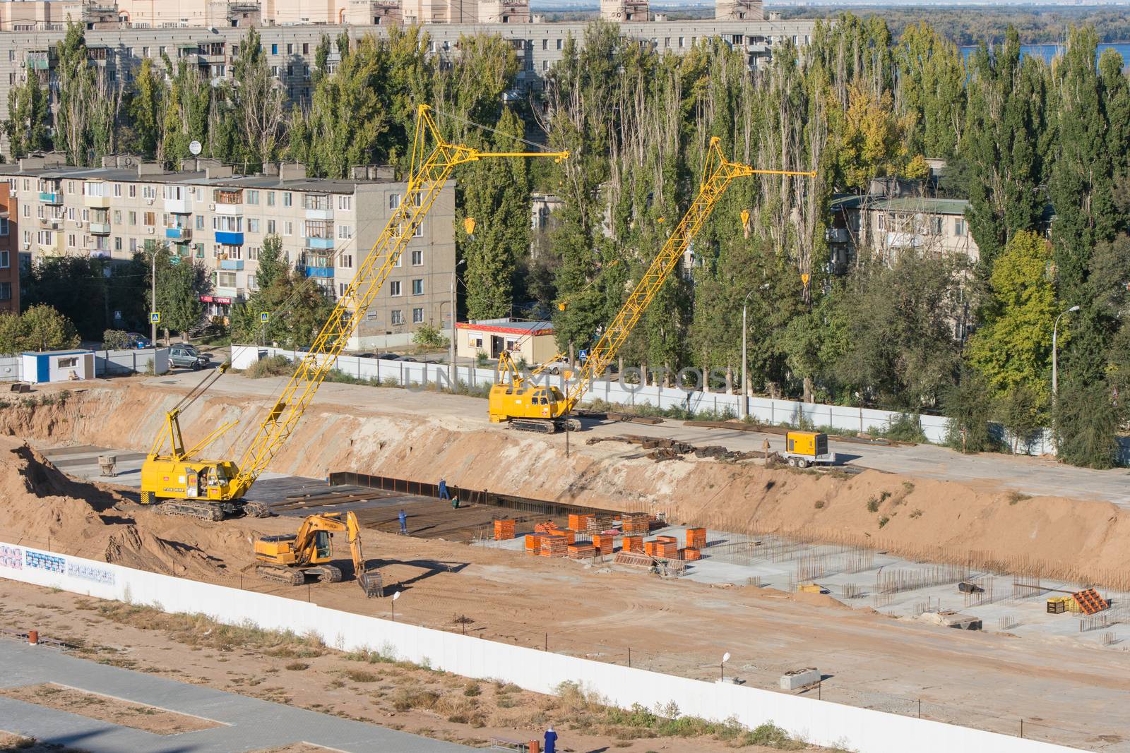 Volgograd, Russia - October 13, 2015: Aerial view of the fenced area on which the construction of a new multi-storey residential house