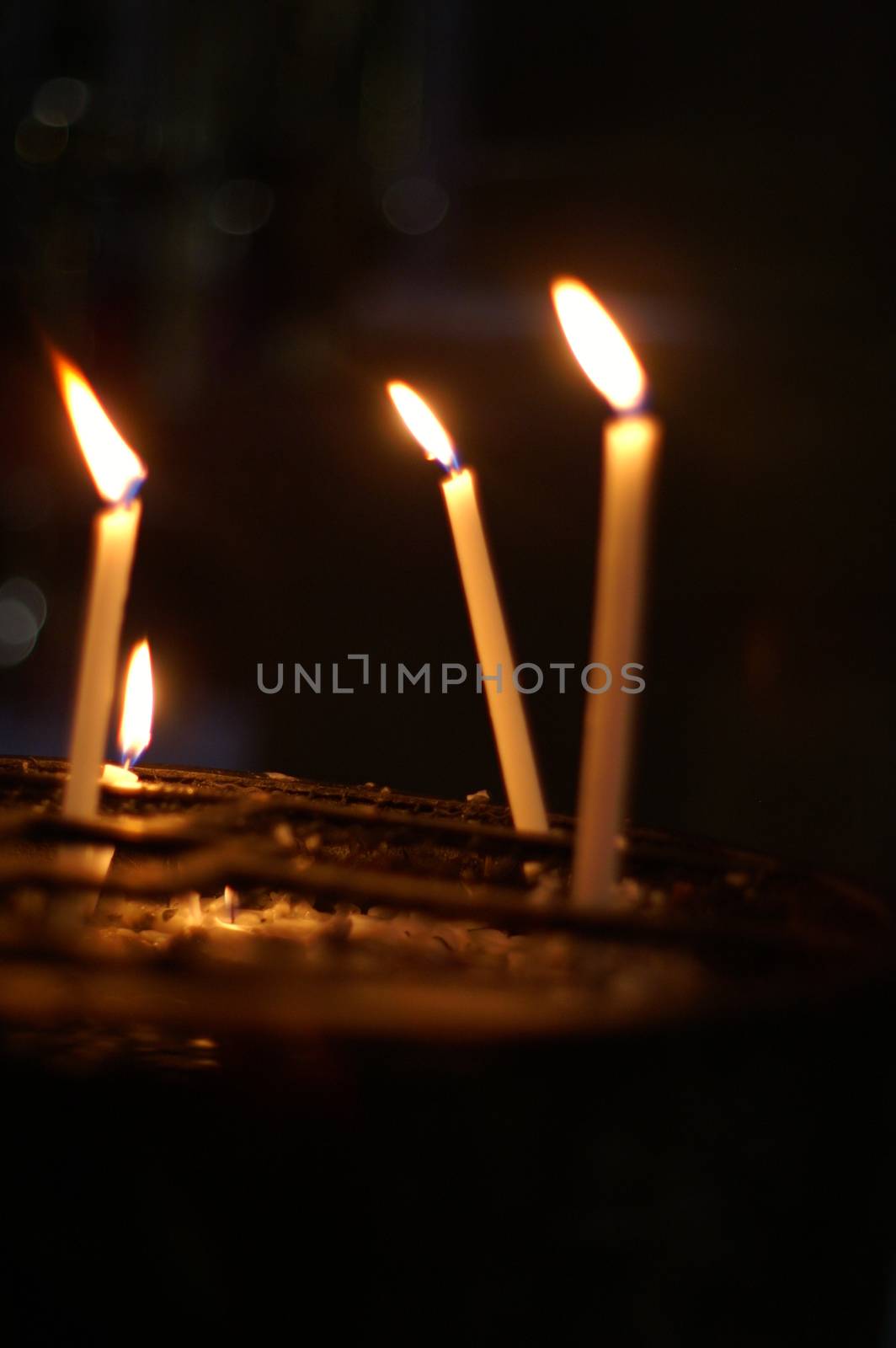 Candles - romantic atmosphere - light in a dark night
