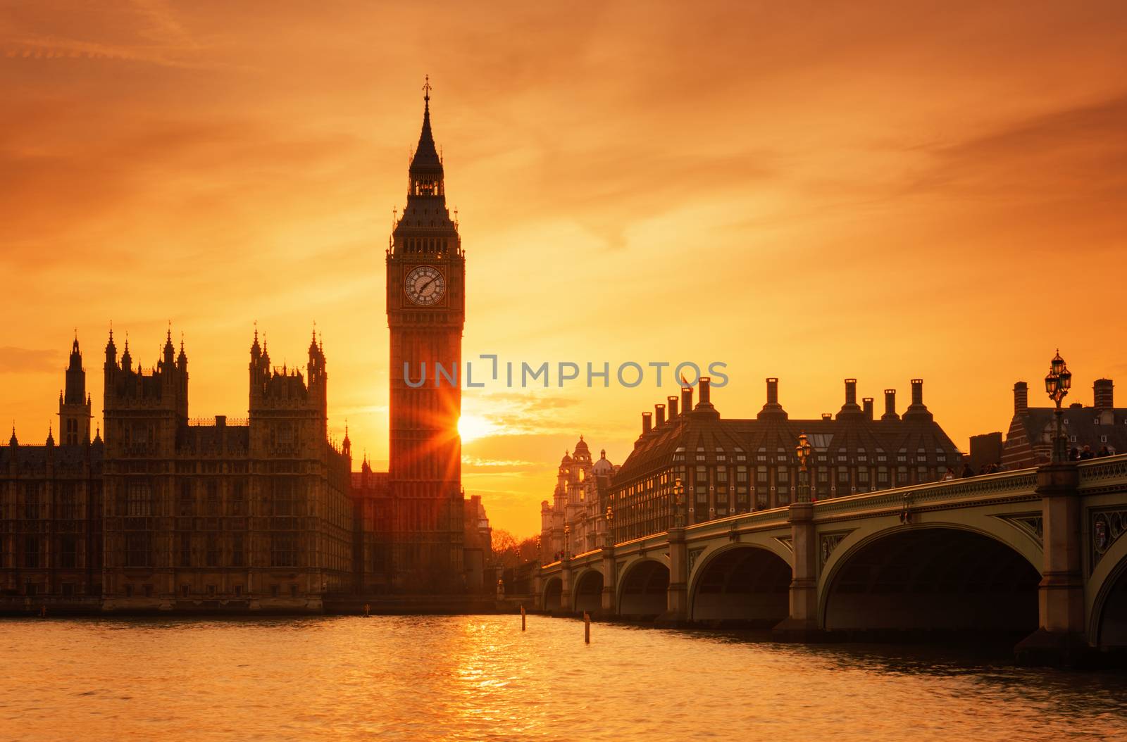 Famous Big Ben clock tower in London at sunset by vwalakte