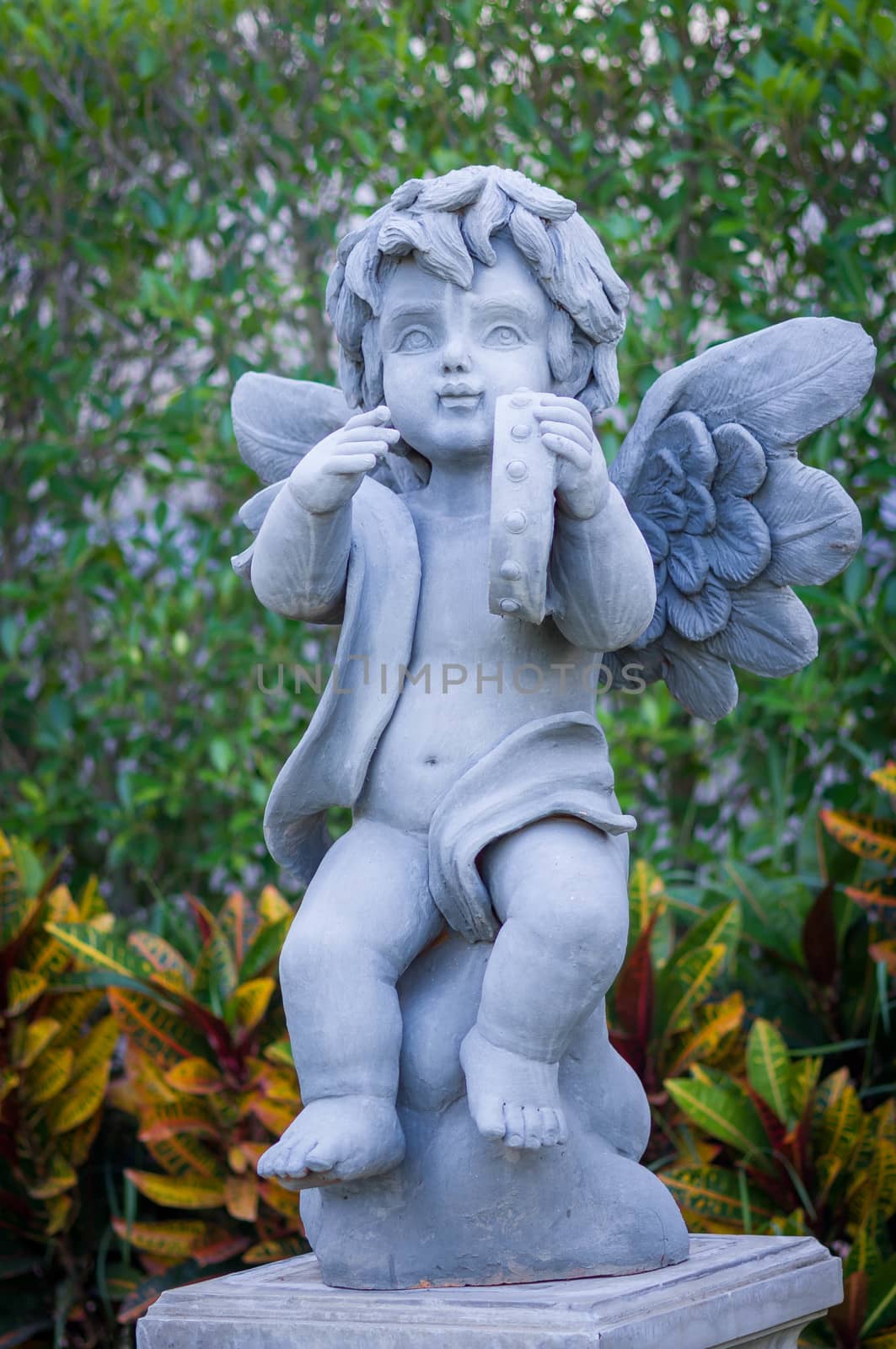 Cupid sculpture by seksan44