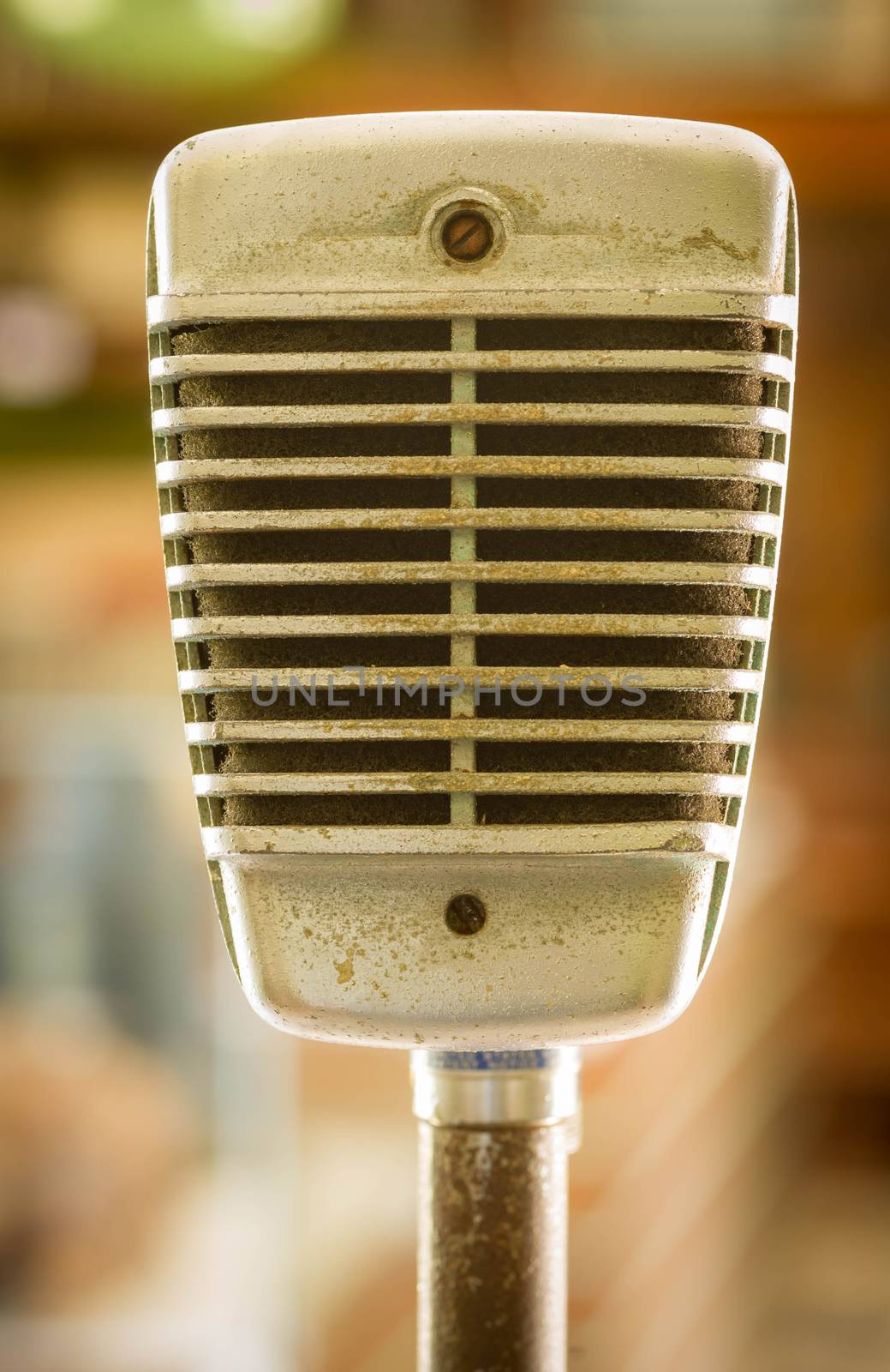 Retro microphone on blur background