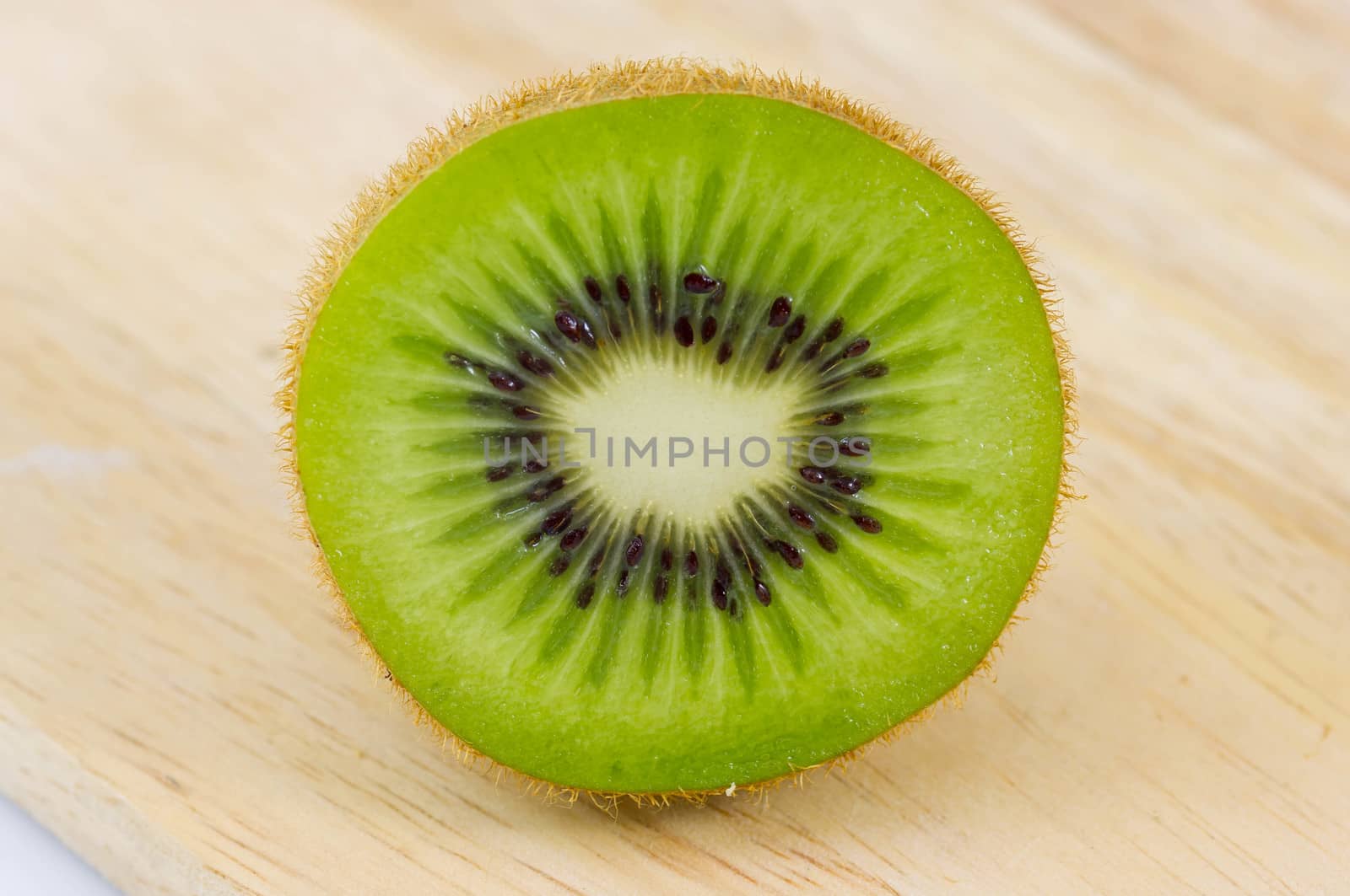 Fresh kiwi fruit on wooden. Wood background.