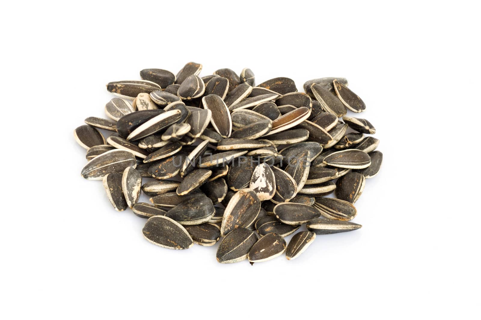 sunflower seeds isolated on white by seksan44