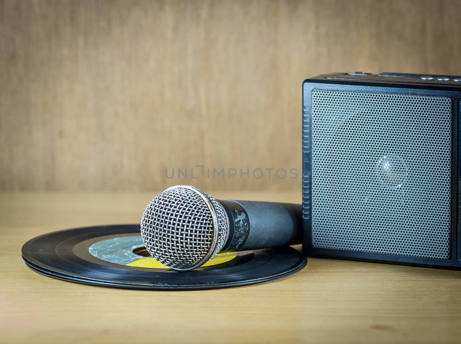 radio and microphone on table. by seksan44