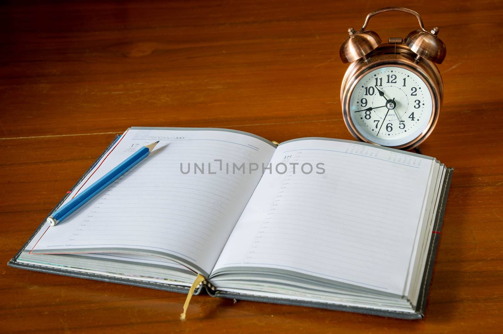 retro alarrm clock and notebook.