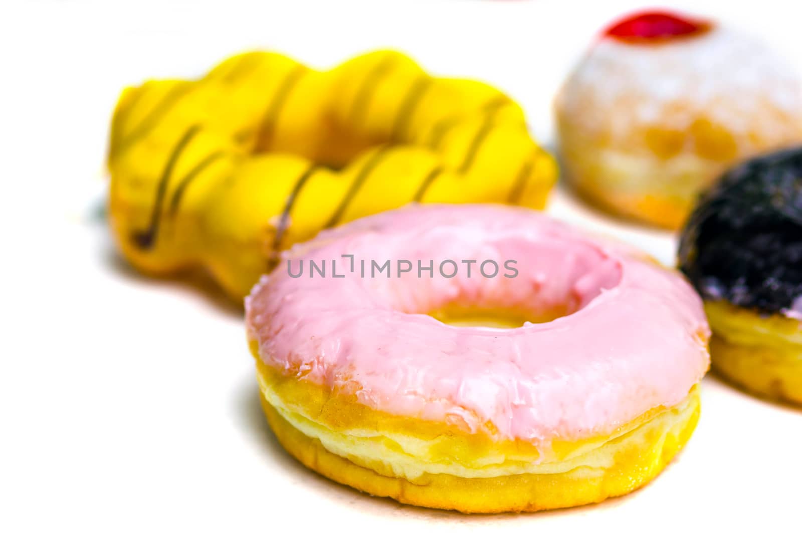 Group of donuts on white background.