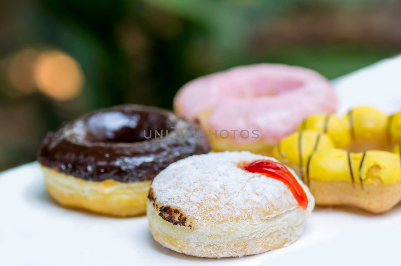 Group of donuts on white background.