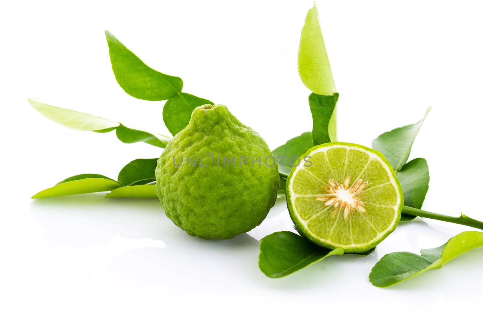 Kaffir lime fresh and leaf isolated on white background.
