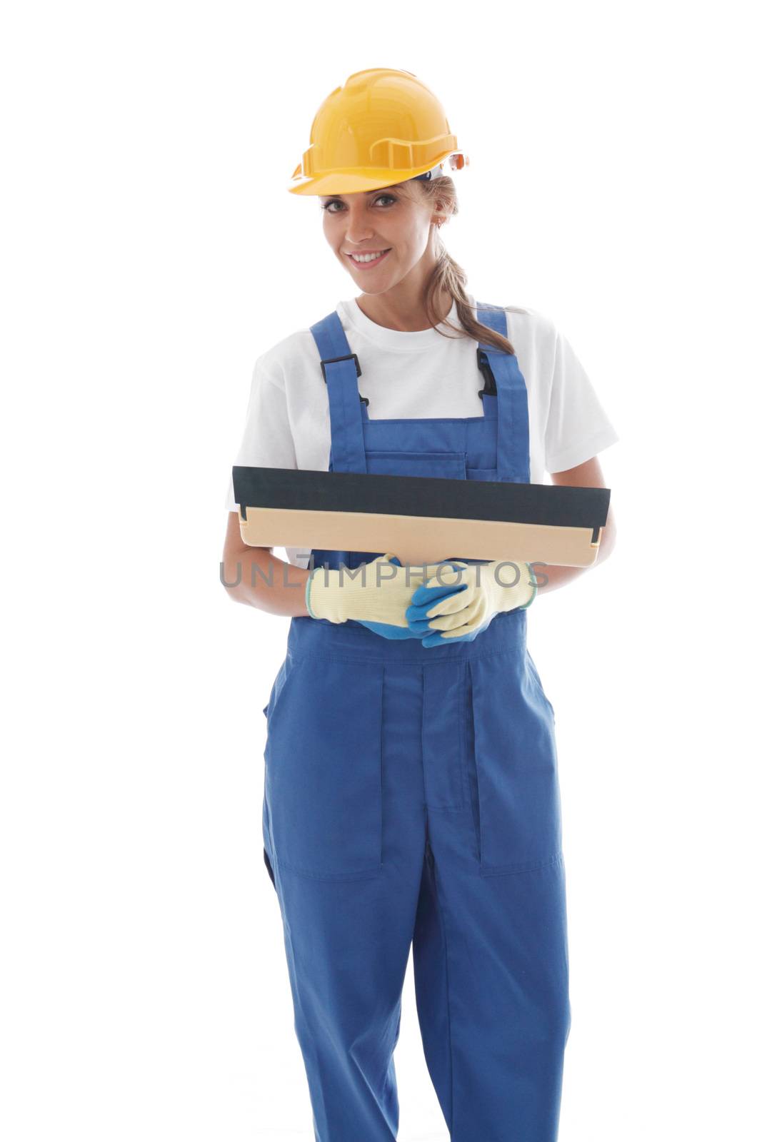 Young beautiful handywoman with masonry trowel isolated on white