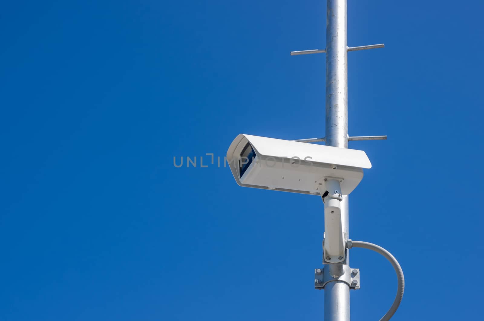Security camera with blue sky