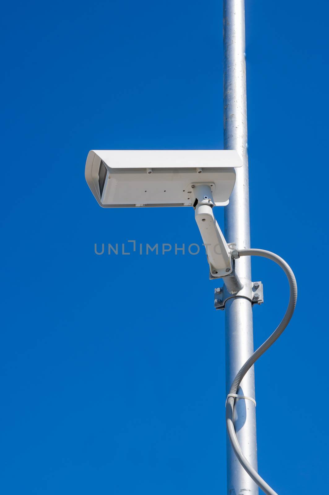 Security camera with blue sky