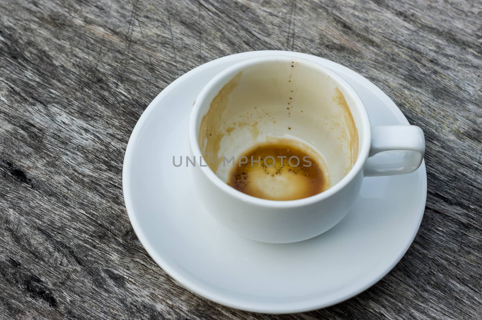 Empty Cup Of Coffee  on wood background.