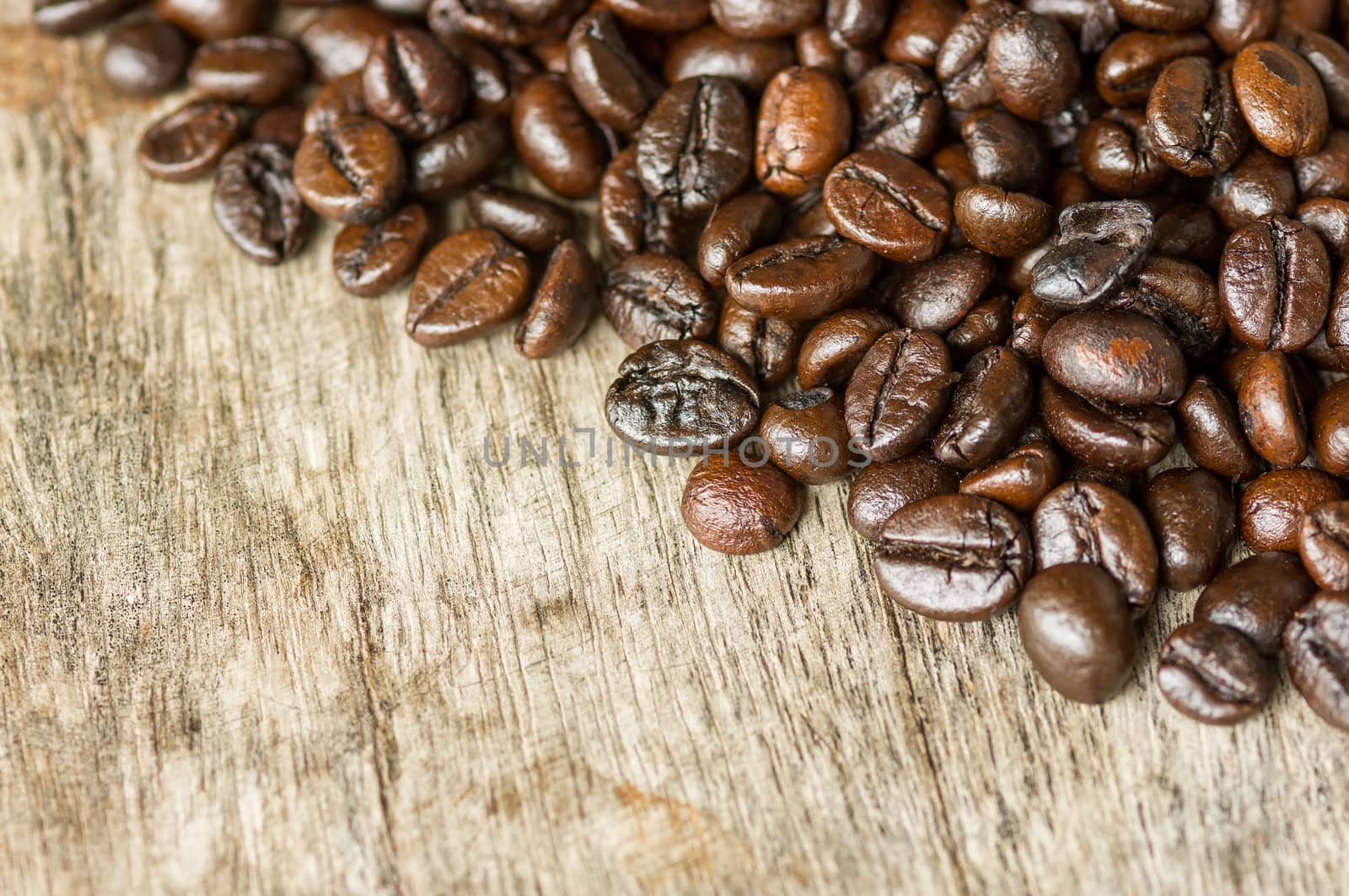 Coffee on grunge wooden background.