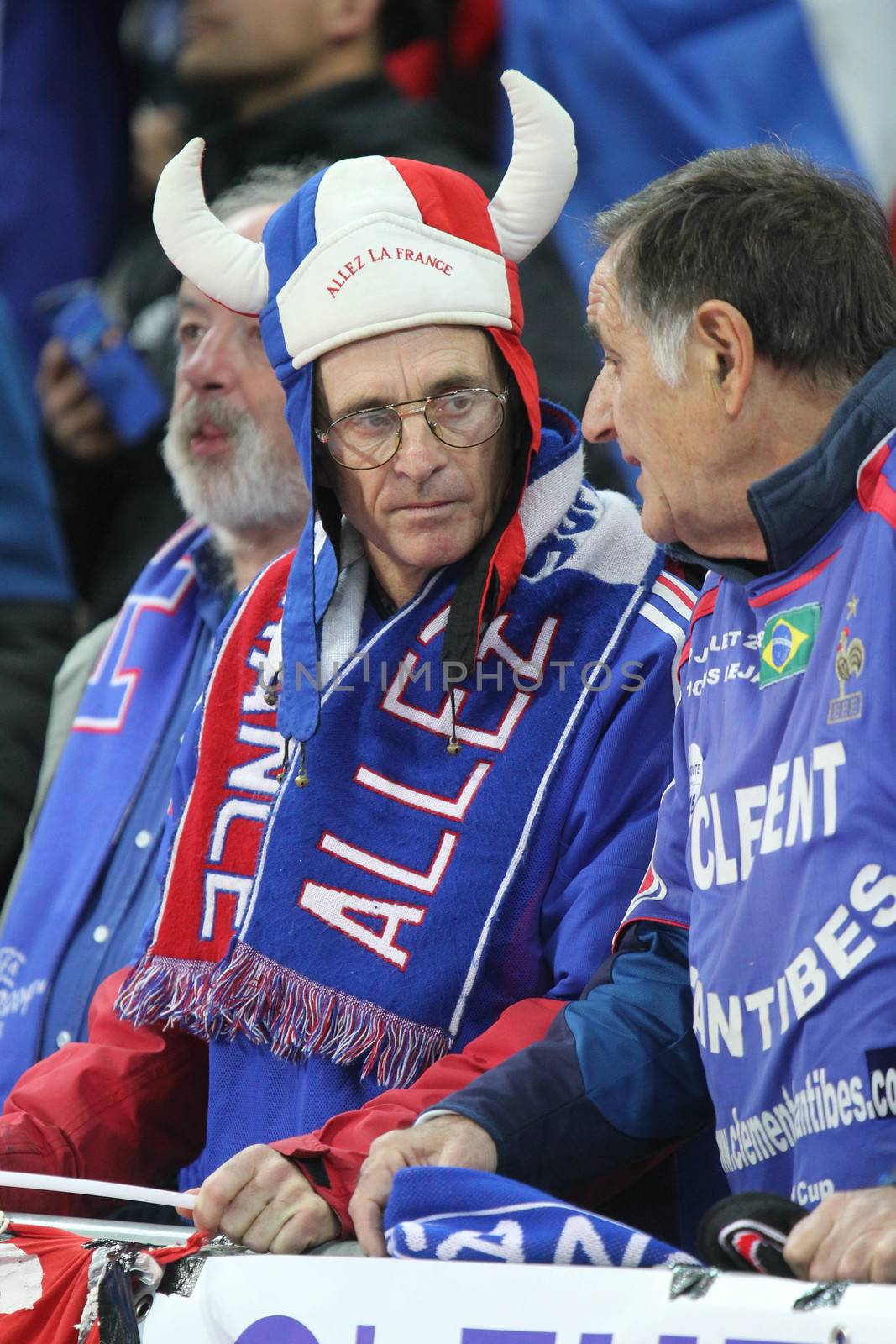 FRANCE, Paris: Fans attend an international friendly soccer match between France and Germany at the Stade de France in Paris on November 13, 2015. At least 100 people are reported to have died in multiple shootings and explosions across Paris on Friday night, including a reported suicide blast which killed three outside the Stade de France. As news emerged of events outside, French President Francois Hollande, in attendance at the match, was able to leave safely while thousands of fans flooded onto the pitch before being evacuated by police. 